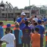 Jim Kelly teaches strong life lessons to youth in Rochester football clinic